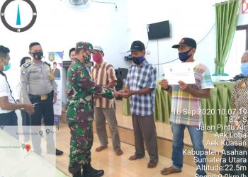 Bantu Penyerahan BLT-DD, Kodim 0208Asahan Babinsa Melalui Koramil 16/Pulau Rakyat