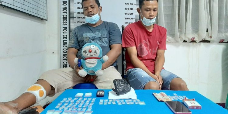 Taufik dan Sugul Ditangkap Sembunyikan Sabu di Bawah Ban Serap dan Dalam Boneka Doraemon Taufik dan Sugul Ditangkap Sembunyikan Sabu di Bawah Ban Serap dan Dalam Boneka Doraemon