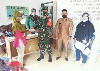 Ikut Mengamankan Penyaluran BLTDD Bagi Masyarakat Oleh Personel Jajaran Kodim 0208/Asahan