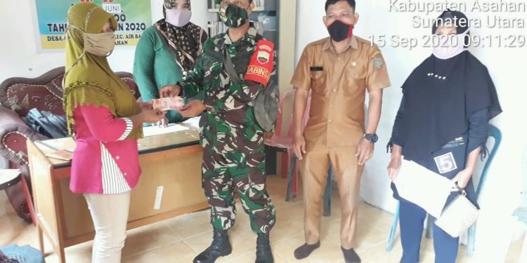 Ikut Mengamankan Penyaluran BLTDD Bagi Masyarakat Oleh Personel Jajaran Kodim 0208/Asahan Ikut Mengamankan Penyaluran BLTDD Bagi Masyarakat Oleh Personel Jajaran Kodim 0208/Asahan
