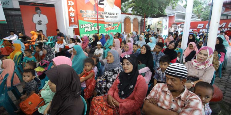 Ratusan Warga Buka Puasa Bersama di Rumah Pemenangan Relawan Djarot-Sihar