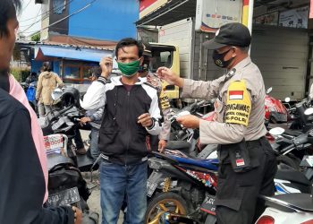 Polsek Caringin Lakukan Patroli Bermasker