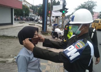 Ratusan Masker Dibagikan Denpom I/5 Cegah Penyebaran Covid-19