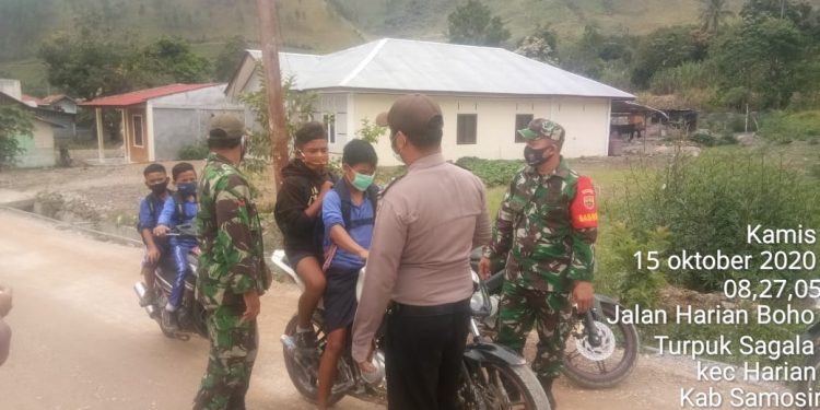 TNI Polri Bersinergi Tegakkan Disiplin Prtokol Kesehatan di Jalan Lintas Harian