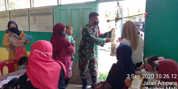 Personel Jajaran Kodim 0208/Asahan Kerjasama Dengan Posyandu Wujudkan Balita Sehat Personel Jajaran Kodim 0208/Asahan Kerjasama Dengan Posyandu Wujudkan Balita Sehat