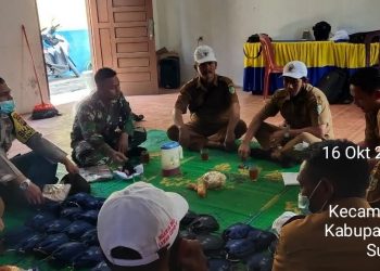 Personel Kodim 0208/Asahan Hadiri Rapat Bersama Pengurus Desa Untuk Pembagian Masker