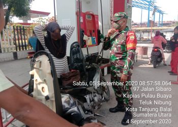 Peduli Masyarakat Agar Terhindar Dari Covid-19, Personel Kodim 0208/Asahan Ingatkan Patuhi Prokes