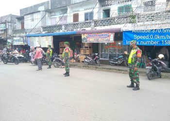 Cegah Penyebaran Covid-19, Babinsa Jajaran Kodim 0207/Simalungun Sosialisasi Protokol Kesehatan Di Pasar Parluasan Siantar