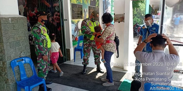 Penegakan Disiplin dan Sosialisasi Protokol Kesehatan yang dilaksanakan bertempat di Taman Hewan Bersama Kodim 0207/Simalungun