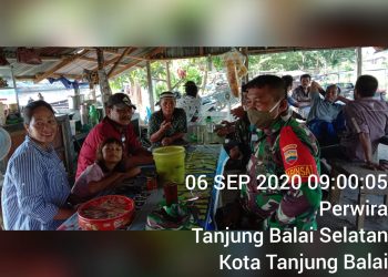 Personel Kodim 0208/Asahan Himbau Warga Tanjung Balai Agar Was-Was dan Tidak Panik Hadapi Wabah Covid-19