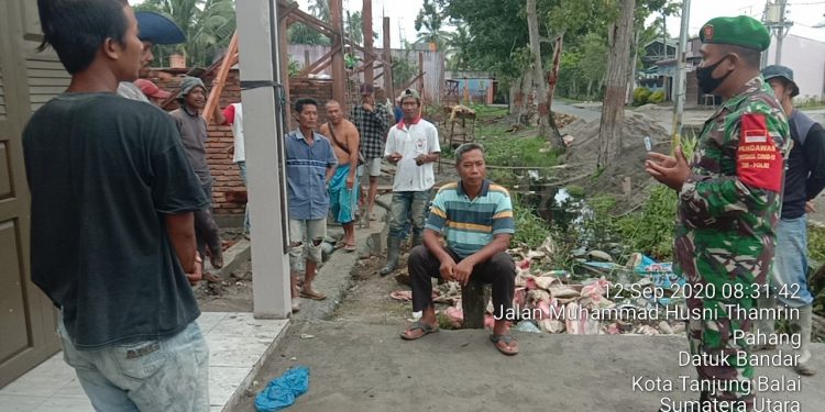 Personel Kodim 0208/Asahan Pantau Warga Agar Mematuhi Protokol Kesehatan