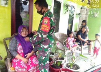 Personil Kodim 0208/Asahan Selalu Himbau Warga Ikuti Protokol Kesehatan Covid-19