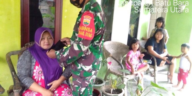 Personil Kodim 0208/Asahan Selalu Himbau Warga Ikuti Protokol Kesehatan Covid-19