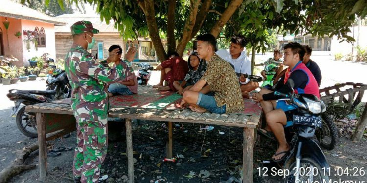 Himbau Warga Jauhi Keramain, Personel Jajaran Kodim 0208/Asahan Sosialisasikan Cegah Covid-19