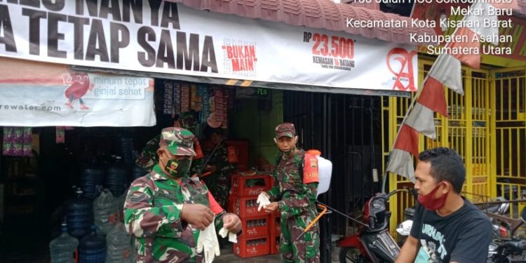 Penyemprotan Disinfektan di Tempat Usaha Warga Binaan Oleh Personel Jajaran Kodim 0208/Asahan