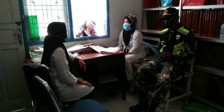 Komsos ke Puskesmas, Personel Kodim 0207/Simalungun Bahas Pencegahan Virus Corona