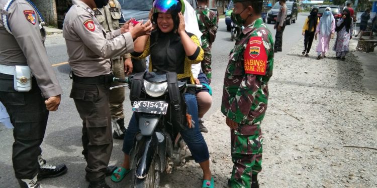 Peduli Warga, Personel Jajaran Kodim 0208/Asahan Ikut Dalam Pelaksanaan Patroli Gabungan Cegah Covid-19