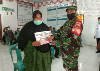 Personel Jajaran Kodim 0208/Asahan Menghadiri Pembagian BLTDD Tahap IV, V, Dan VI Di Kabupaten Asahan