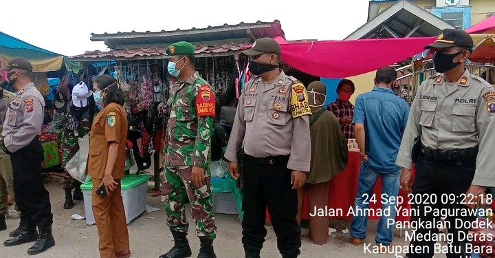 Personel Jajaran Kodim 0208/Asahan Ajak Warga Untuk Ikut Sebarkan Protokol Kesehatan