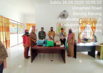 TNI-POLRI Dan Aparat Desa Laksanakan Karya Bhakti Berbagi Masker