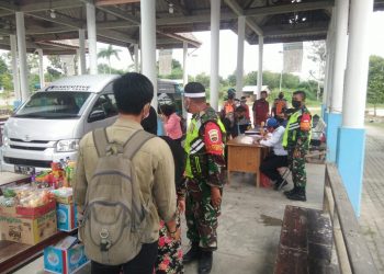 Beri Rasa Aman dan Laksanakan Prokes, Kodim 0207/Simalungun Laksanakan Penerapan Protokol Kesehatan di Terminal Tanjung Pinggir
