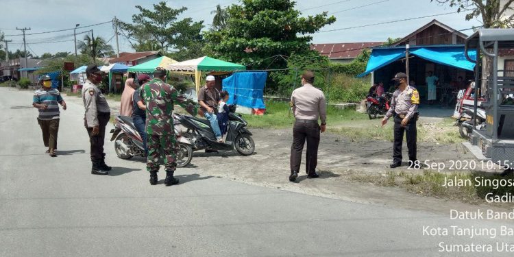 Jajaran Kodim 0208/Asahan Bekerjasama Dengan Polsek Datuk Bandar Dalam Memberantas Virus Corona Jajaran Kodim 0208/Asahan Bekerjasama Dengan Polsek Datuk Bandar Dalam Memberantas Virus Corona