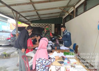 Bantuan Beras Dari Kemensos Telah Tiba, Personel Jajaran Kodim 0208/Asahan Bantu Pendistribusiannya Kepada Warga