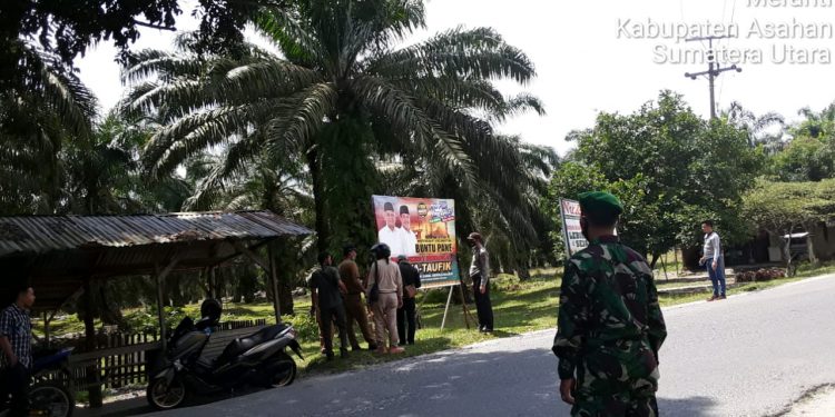 Dampingi Penertiban Alat Peraga Kampanye (APK) Oleh Personil Koramil-13/Bandar Pulau Kodim 0208/Asahan Dampingi Penertiban Alat Peraga Kampanye (APK) Oleh Personil Koramil-13/Bandar Pulau Kodim 0208/Asahan