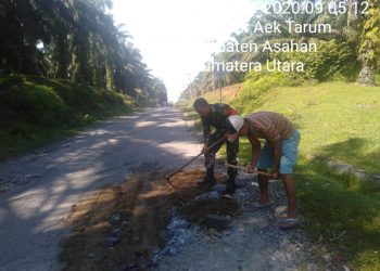Personel Jajaran Kodim 0208/Asahan Perbaiki Jalan Bersama Masyarakat Warga Binaan