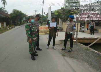 Personel Jajaran Kodim0208/Asahan Bersama Personel Polsek Sei Kepayang Melaksanakan Razia Yustisi Pendisiplinan Protokol Kesehatan