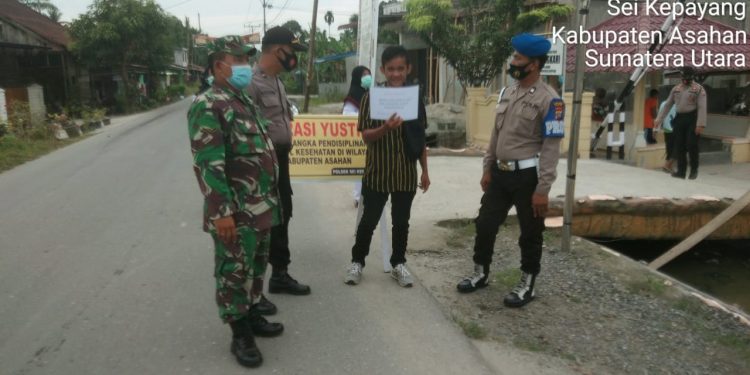 Personel Jajaran Kodim0208/Asahan Bersama Personel Polsek Sei Kepayang Melaksanakan Razia Yustisi Pendisiplinan Protokol Kesehatan