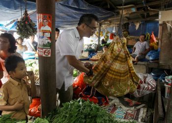 Sihar Sapa Pedagang Rempah yang Bawa Bayinya Jualan di Pasar