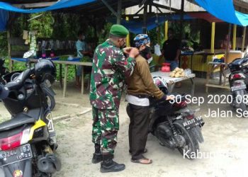 Kodim 0208/Asahan Melalui Koramil-07/Air Joman Babinsa Giatkan Sosialisasi Dan Himbauan Mengenai Pencegahan Covid-19