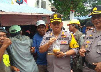 Jumat Barokah, Polres Pelabuhan Belawan Gelar Pengobatan dan Pembagian Makanan Gratis