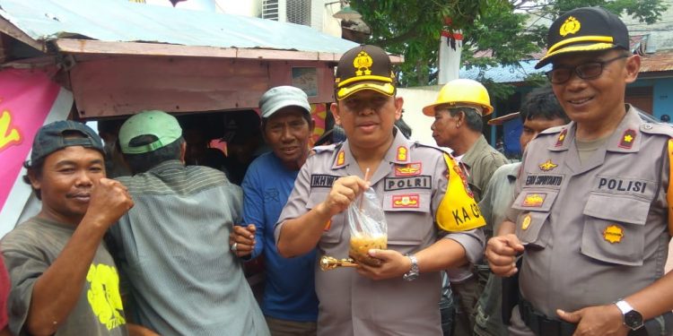 Jumat Barokah, Polres Pelabuhan Belawan Gelar Pengobatan dan Pembagian Makanan Gratis