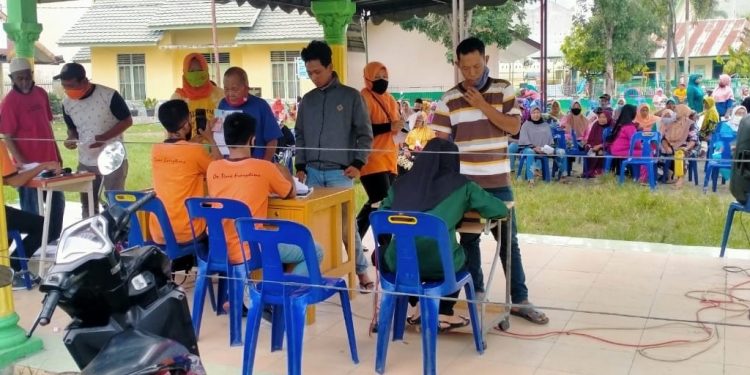 Penyaluran Dana BST, Polsek Perbaungan Pastikan Masyarakat Patuhi Protokol Kesehatan Penyaluran Dana BST, Polsek Perbaungan Pastikan Masyarakat Patuhi Protokol Kesehatan