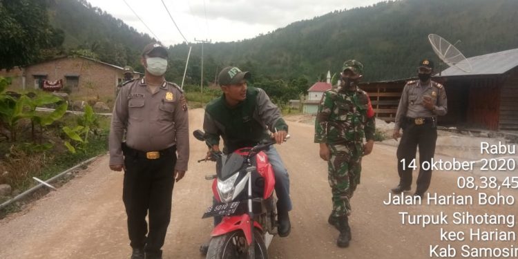 Koramil Harian Boho dan Polsek Harian Tegakkan disiplin Protokol Kesehatan