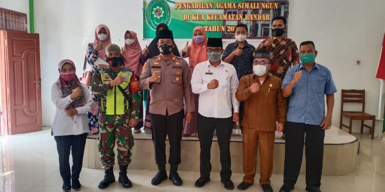 Kapolsek Perdagangan Hadiri Penyerahan Reward MTQ dan Tali Asih