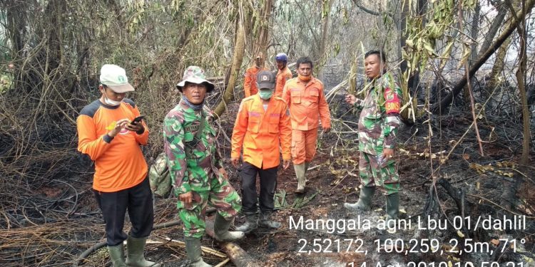 Personel Kodim 0209/LB Berhasil Padamkan Karhutla Personel Kodim 0209/LB Berhasil Padamkan Karhutla