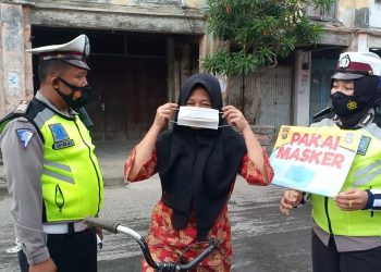 Polres Tanjungbalai Bagikan Masker Gratis dan Imbau Warga Patuhi Prokes