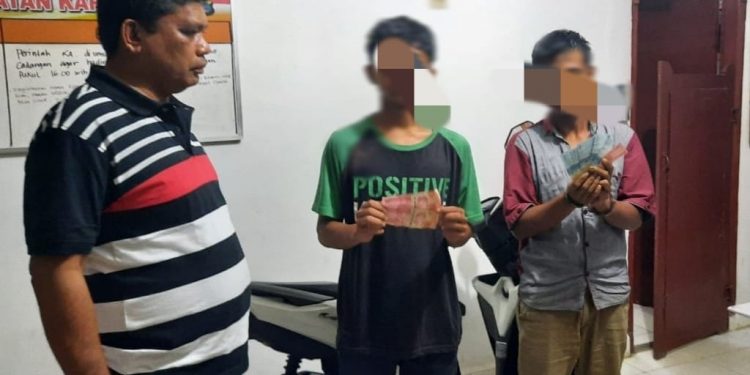 Kios Cabe Nurmauli boru Marpaung Dibobol, Dua Pelaku Diarak ke Kantor Polisi