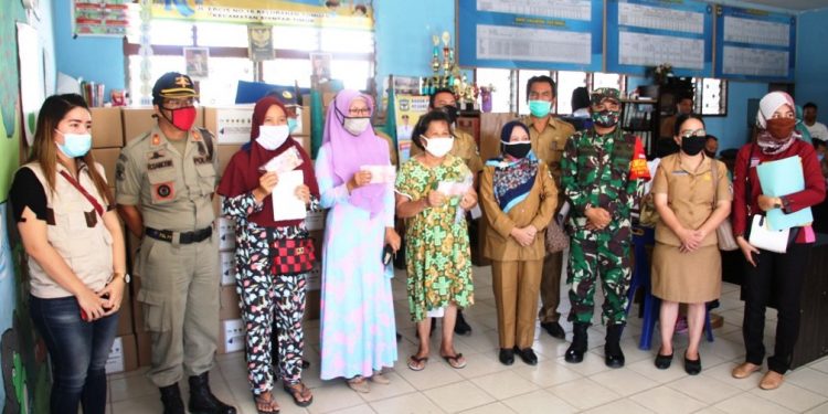 Penyaluran JPS Tahap III di Siantar, Tak Pakai Masker Jangan Dilayani!