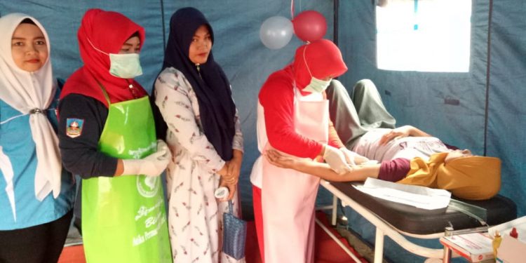 Sukseskan KB, Koramil 03/Pulau Punjung Gelar Bakti Sosial KB Kes-TNI