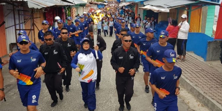 Kirab Obor Asian Games 2018, Team Polres Simalungun Sukses Antarkan Obor Hingga Ke Balige