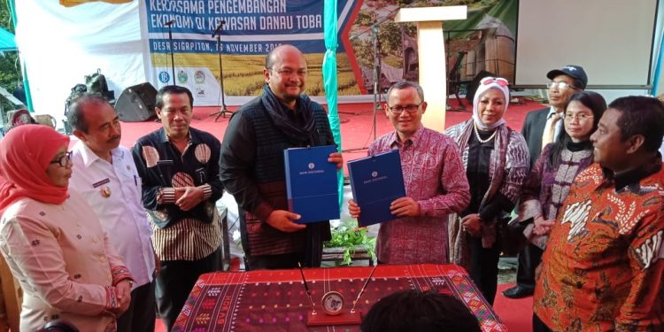 Melirik Potensi Ekonomi Danau Toba, BI dan BPODT Teken MoU Melirik Potensi Ekonomi Danau Toba, BI dan BPODT Teken MoU