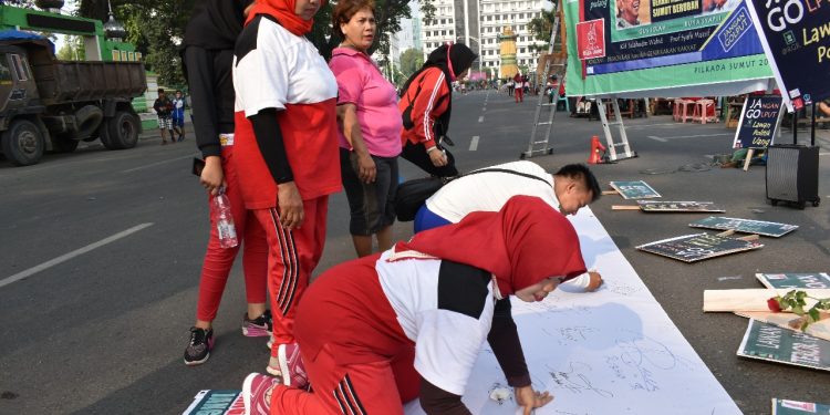 Ada Ajakan Tolak Politik Uang di Car Free Day Merdeka Walk Medan