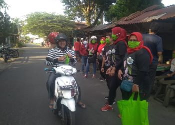 Tangkal Corona, DPC Pujakesuma Siantar Barat Bagikan Masker