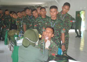 Prajurit Yonif 122/TS Laksanakan Giat Aplikasi Komputerisasi Rekam Wajah