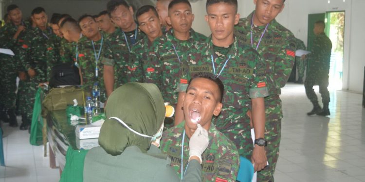 Prajurit Yonif 122/TS Laksanakan Giat Aplikasi Komputerisasi Rekam Wajah