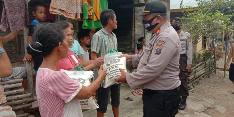 Polres Batubara Salurkan Bantuan Sembako dan Masker Wilayah Terpencil Batu Tohap